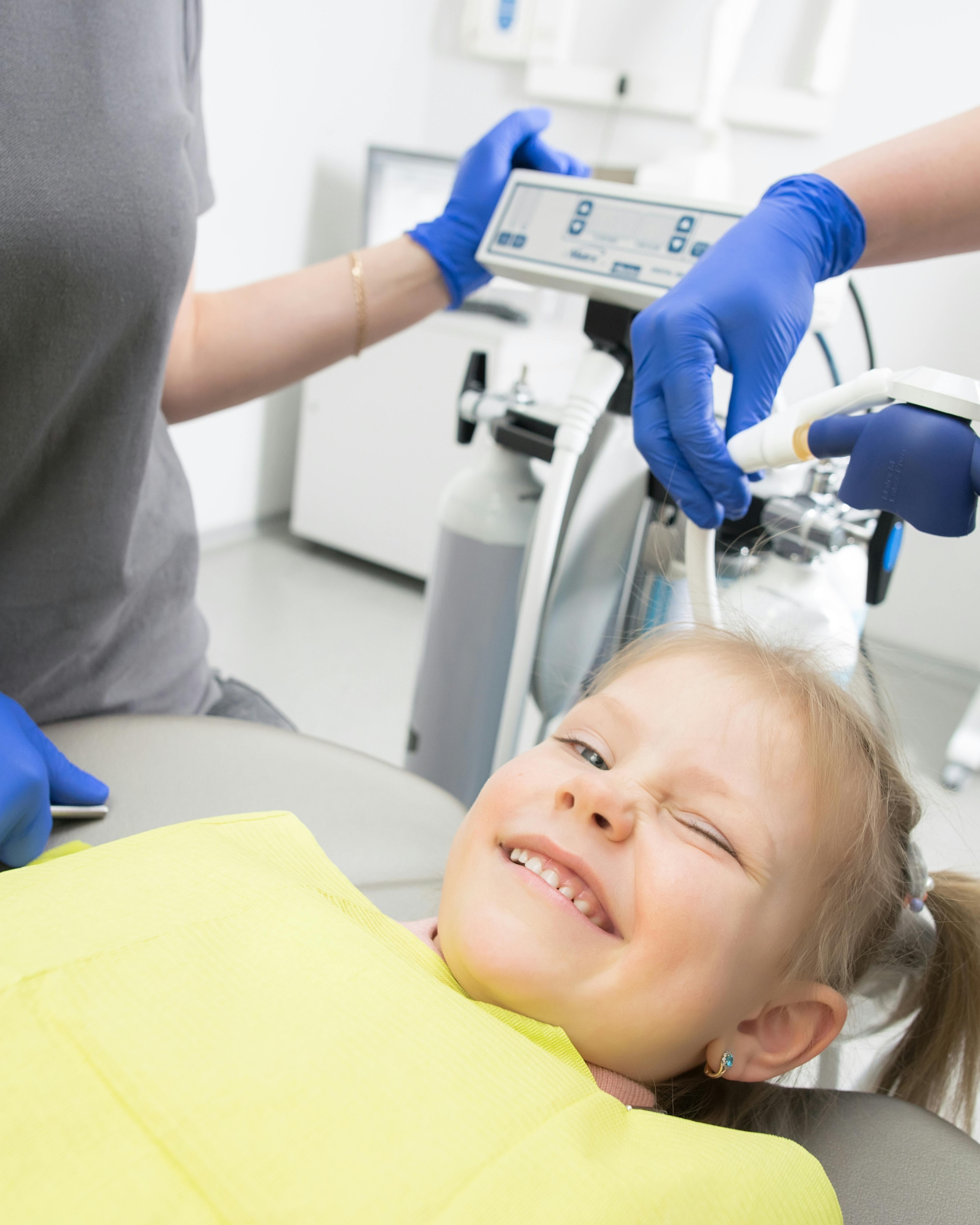 Young Girl At Dentist Checkup
