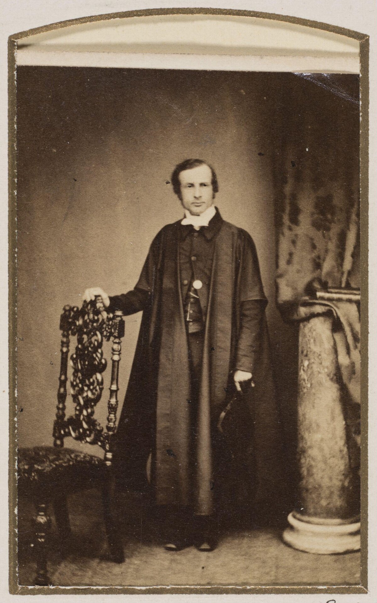 Vintage Portrait of Standing Clergyman