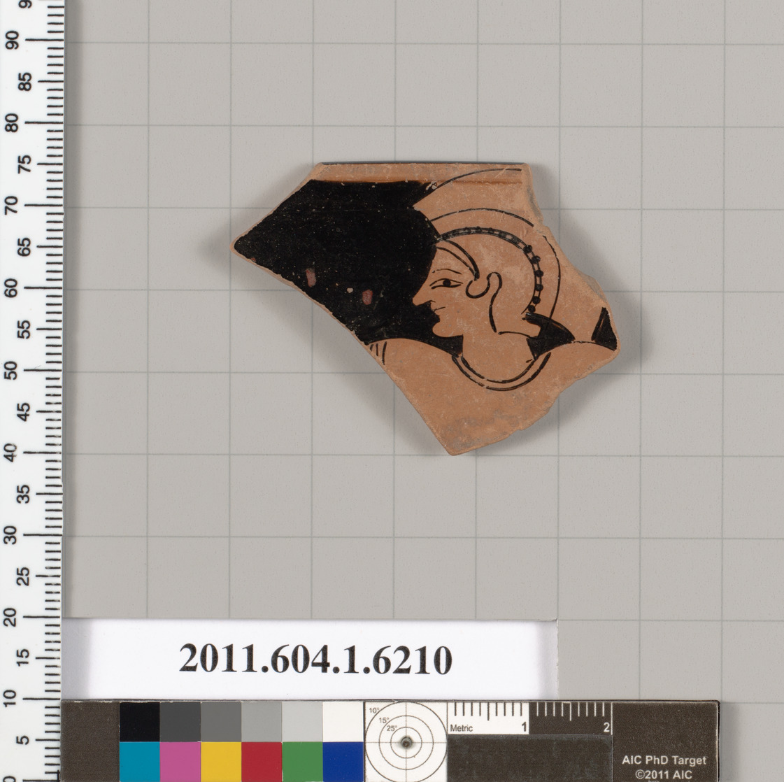 Ancient Pottery Fragment with Head Drawing
