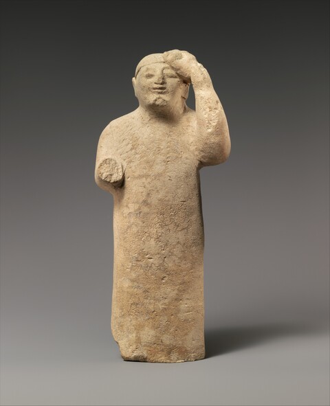 Ancient Stone Standing Figure