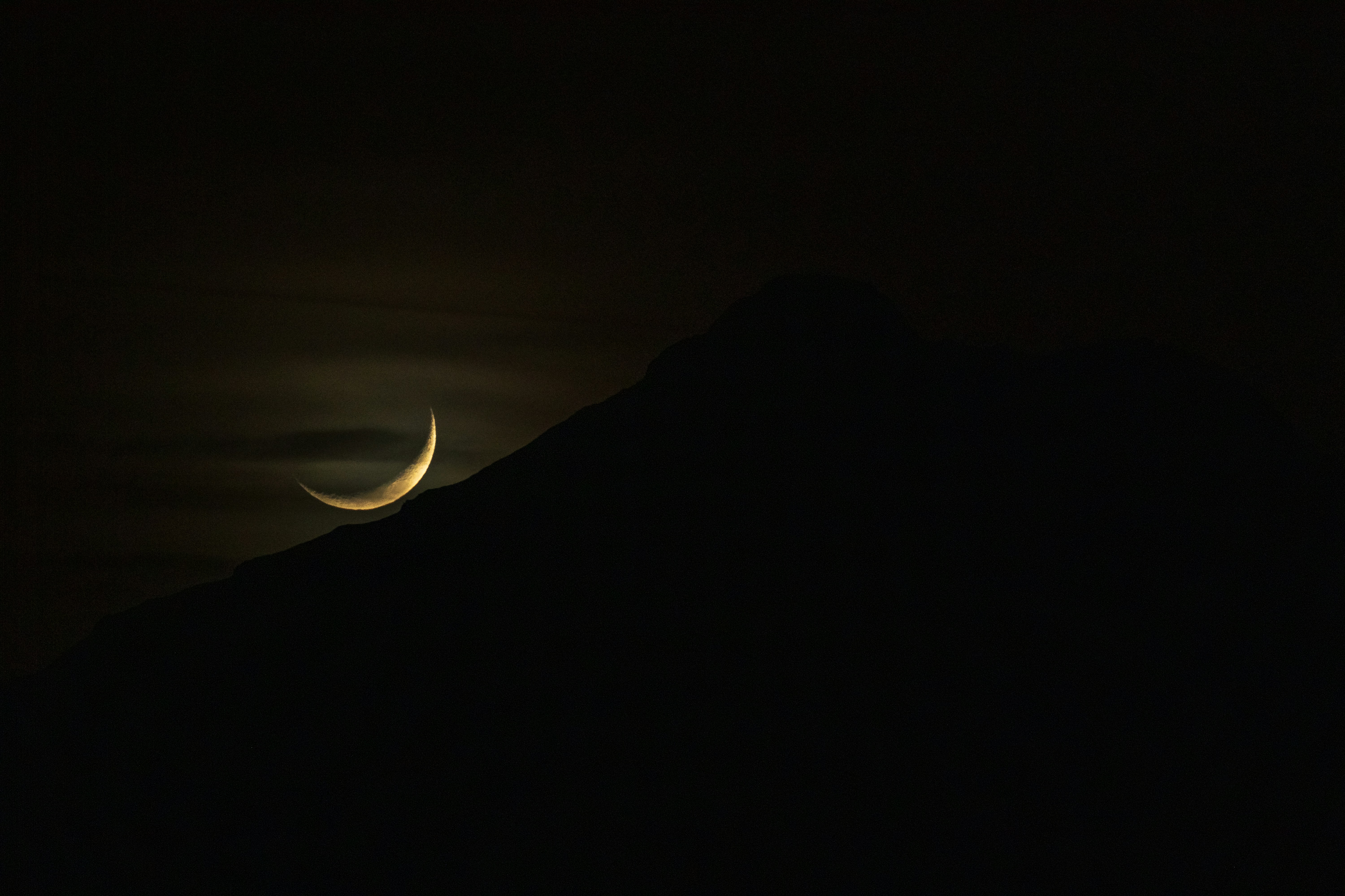 Crescent Moon Over Dark Mountain