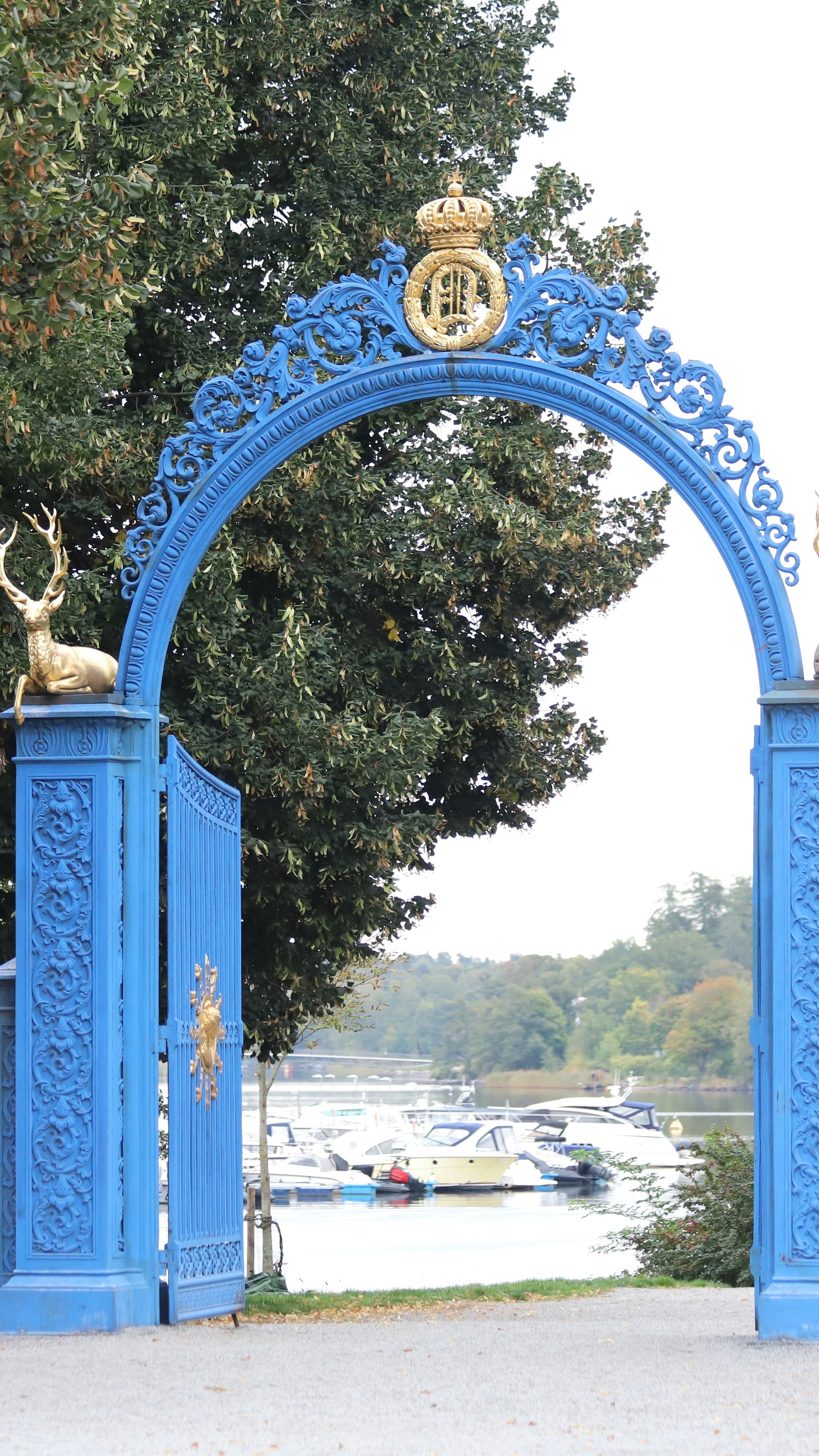 Ornate Blue Royal Gate by Waterfront