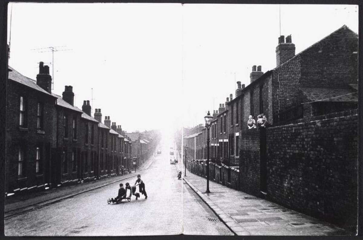 Children Playing with Cart on Terraced Street