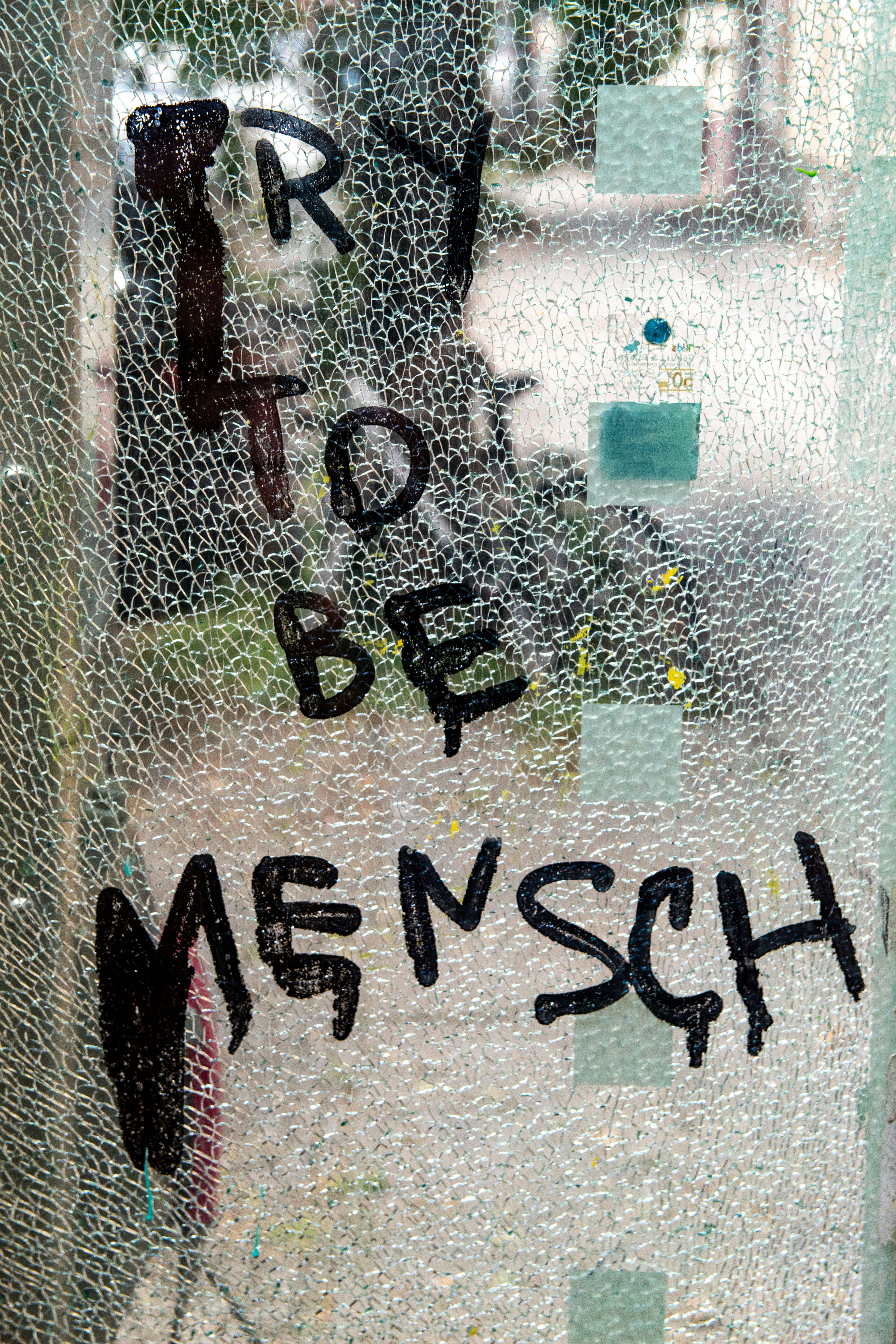 Graffiti Text on Shattered Glass