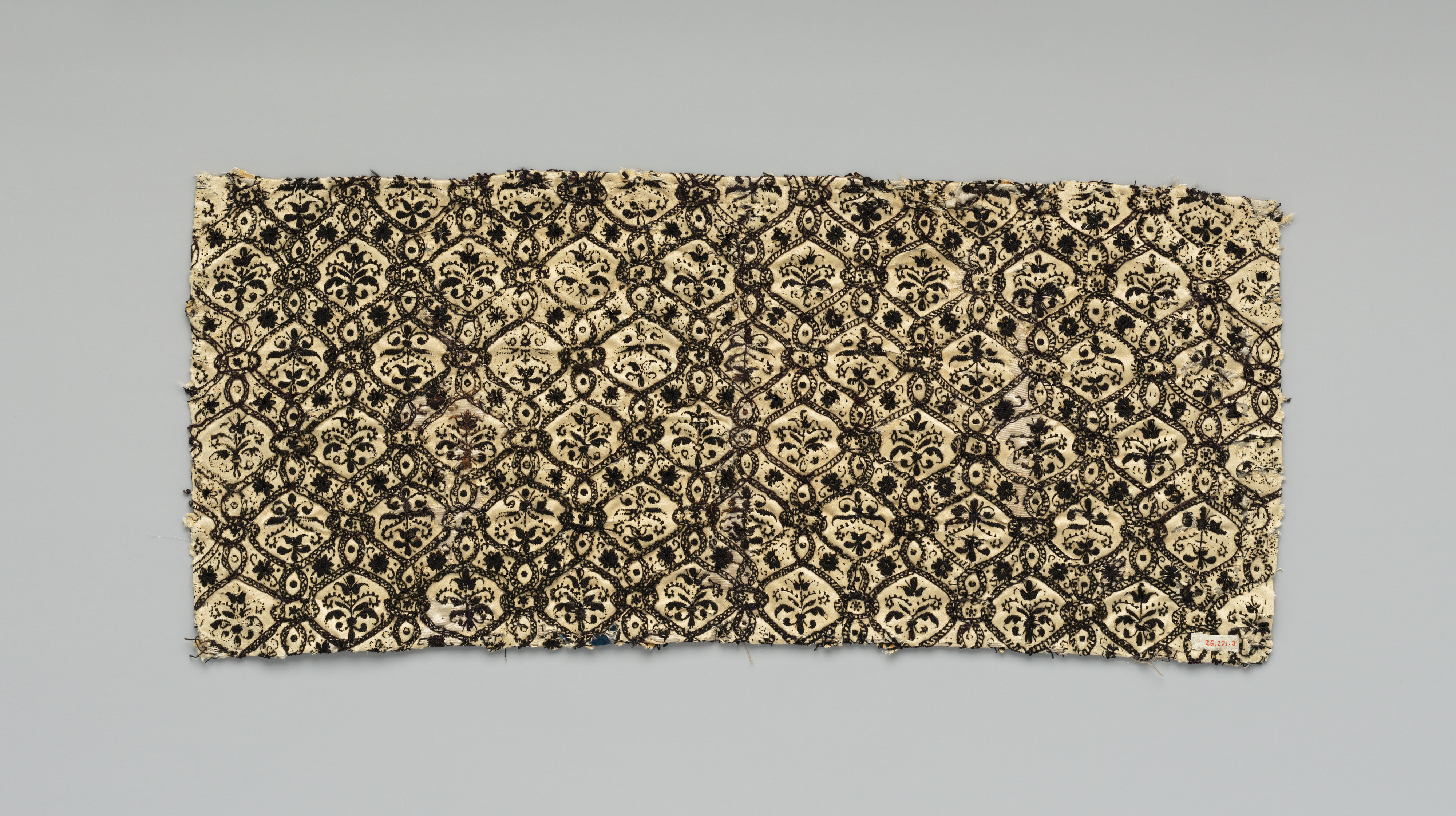 Antique Black Patterned Embroidered Textile