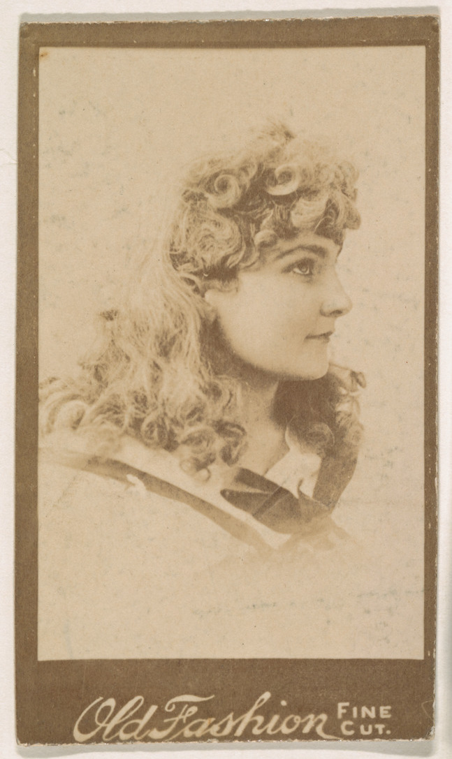 Vintage Portrait of Curly-Haired Young Woman
