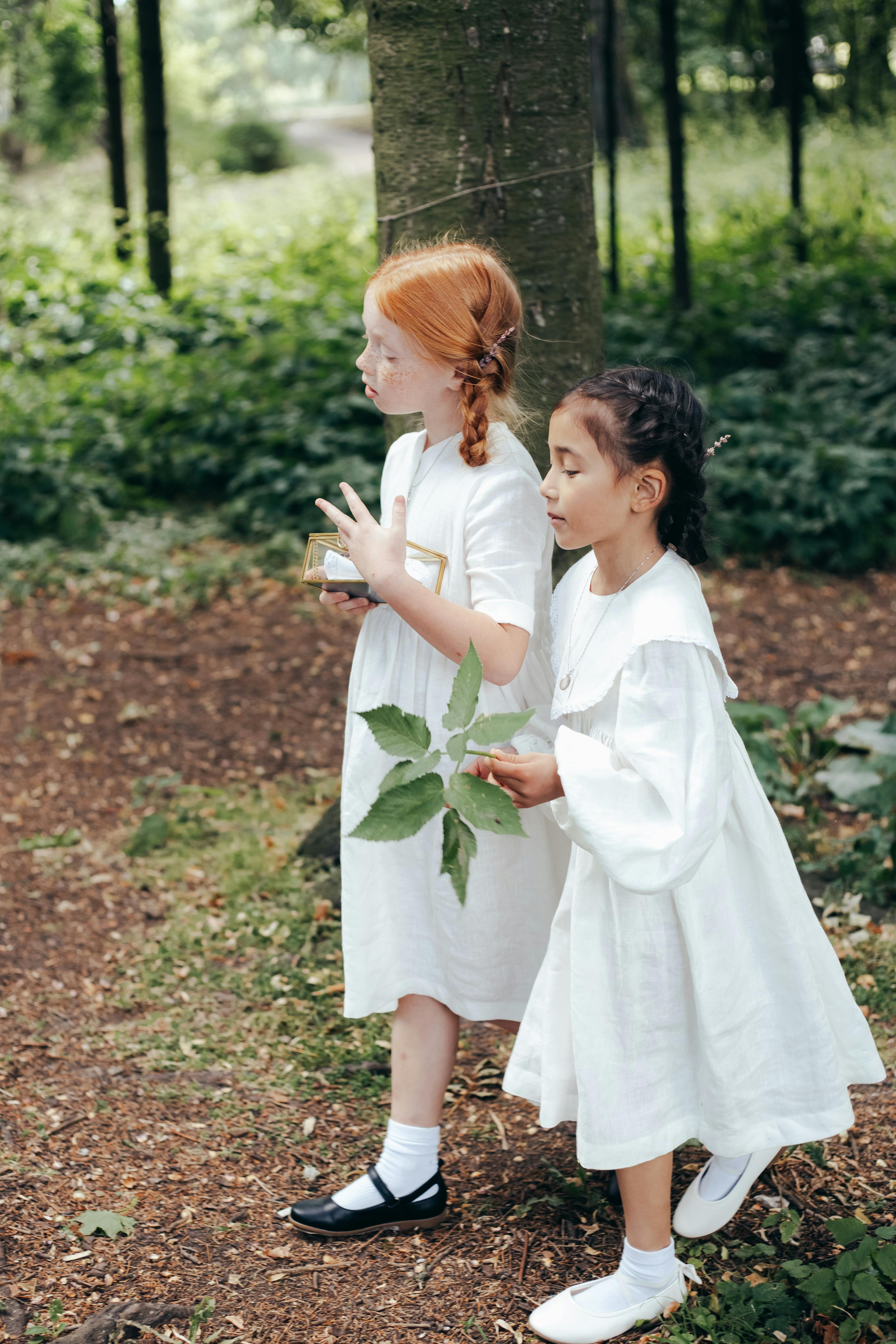 Two Girls Walking in Woodland