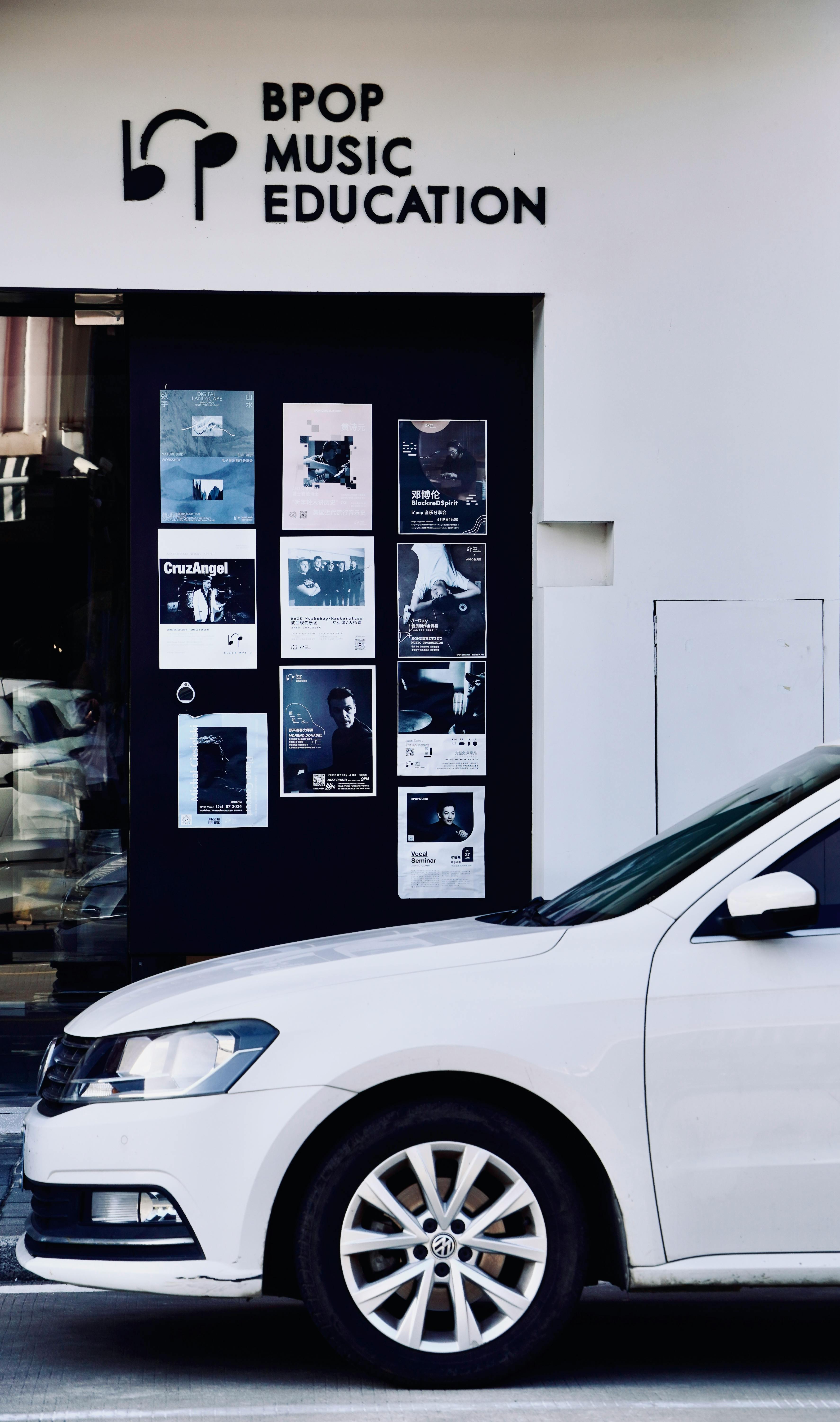 BPOP Music Education Storefront With Parked Car