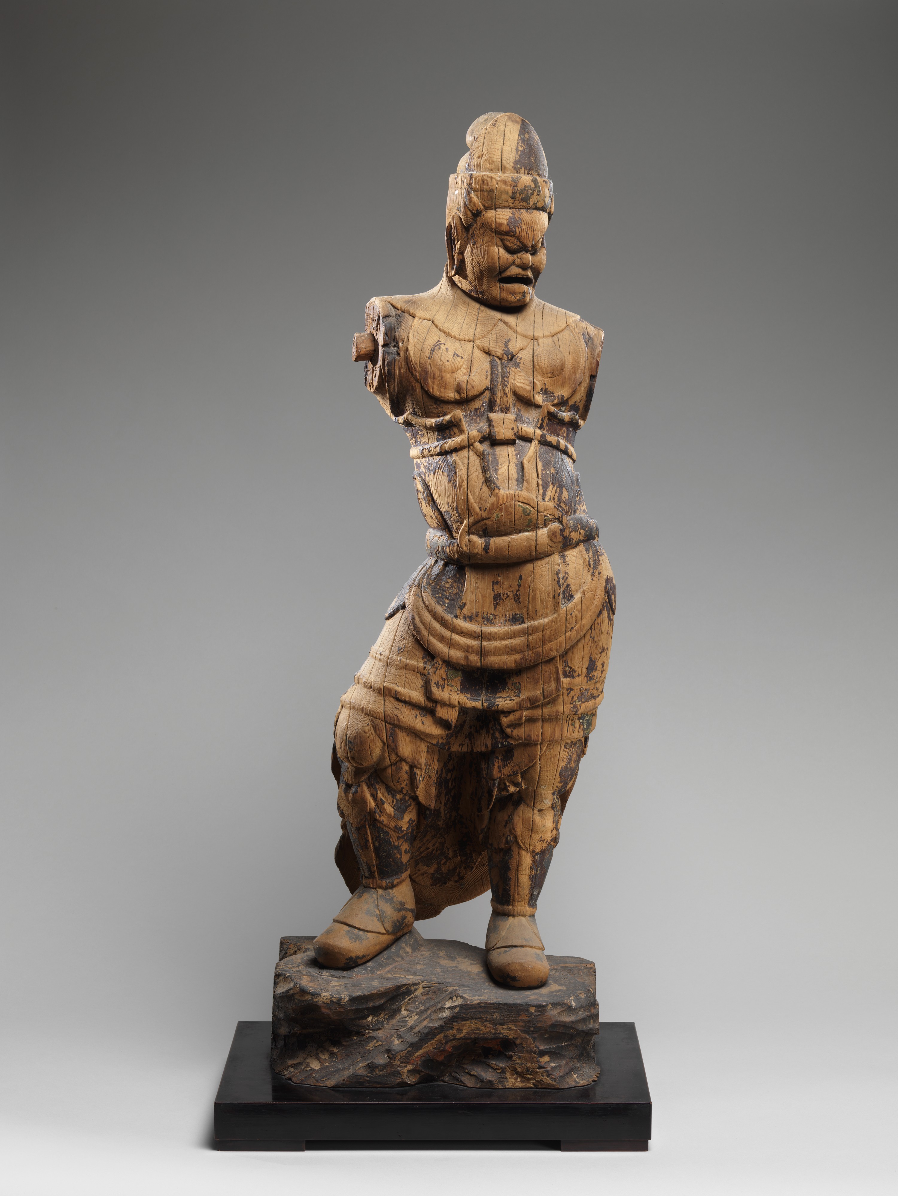 Ancient Wooden Carved Guardian Statue