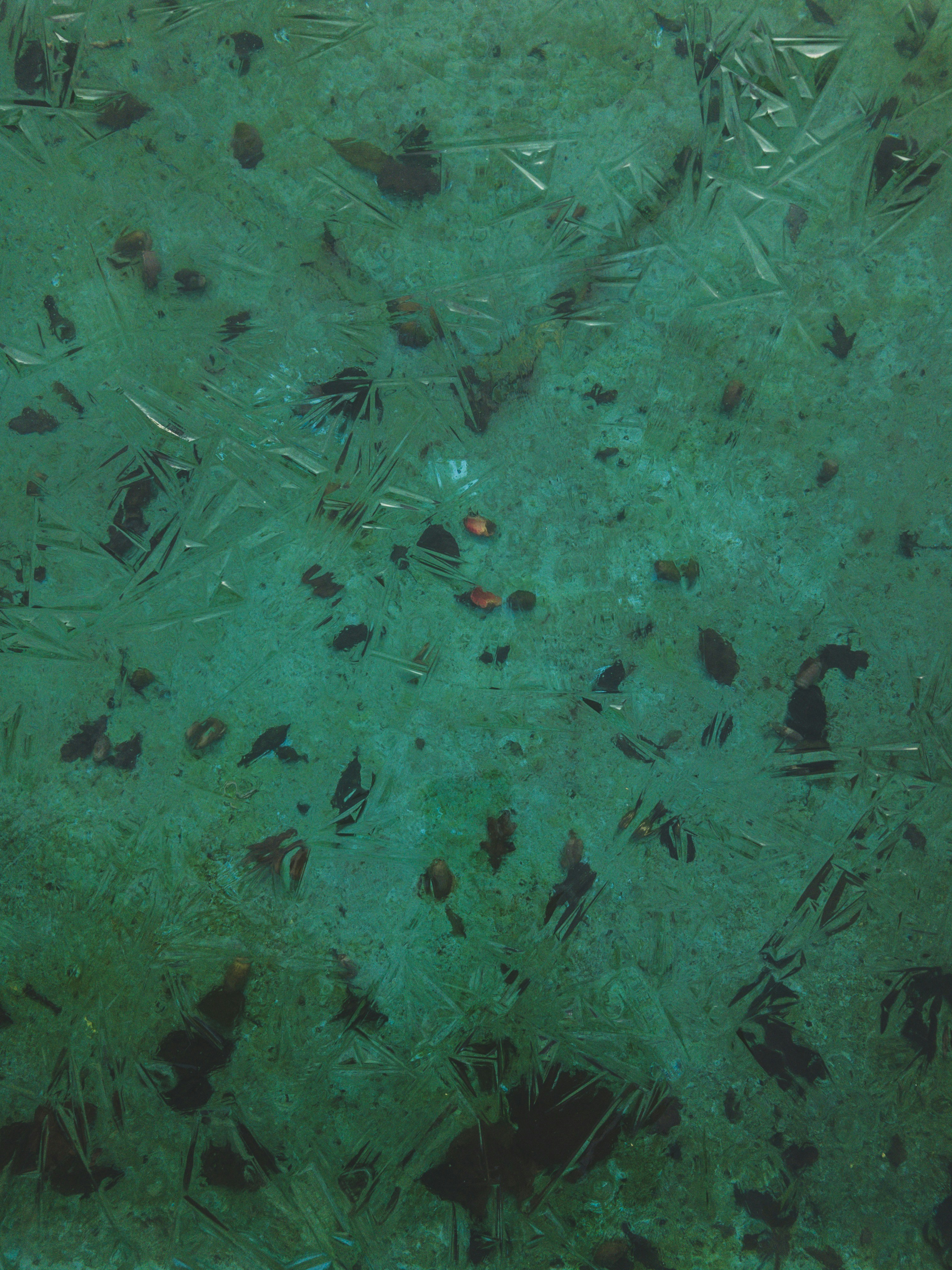 Cracked Turquoise Ice Surface