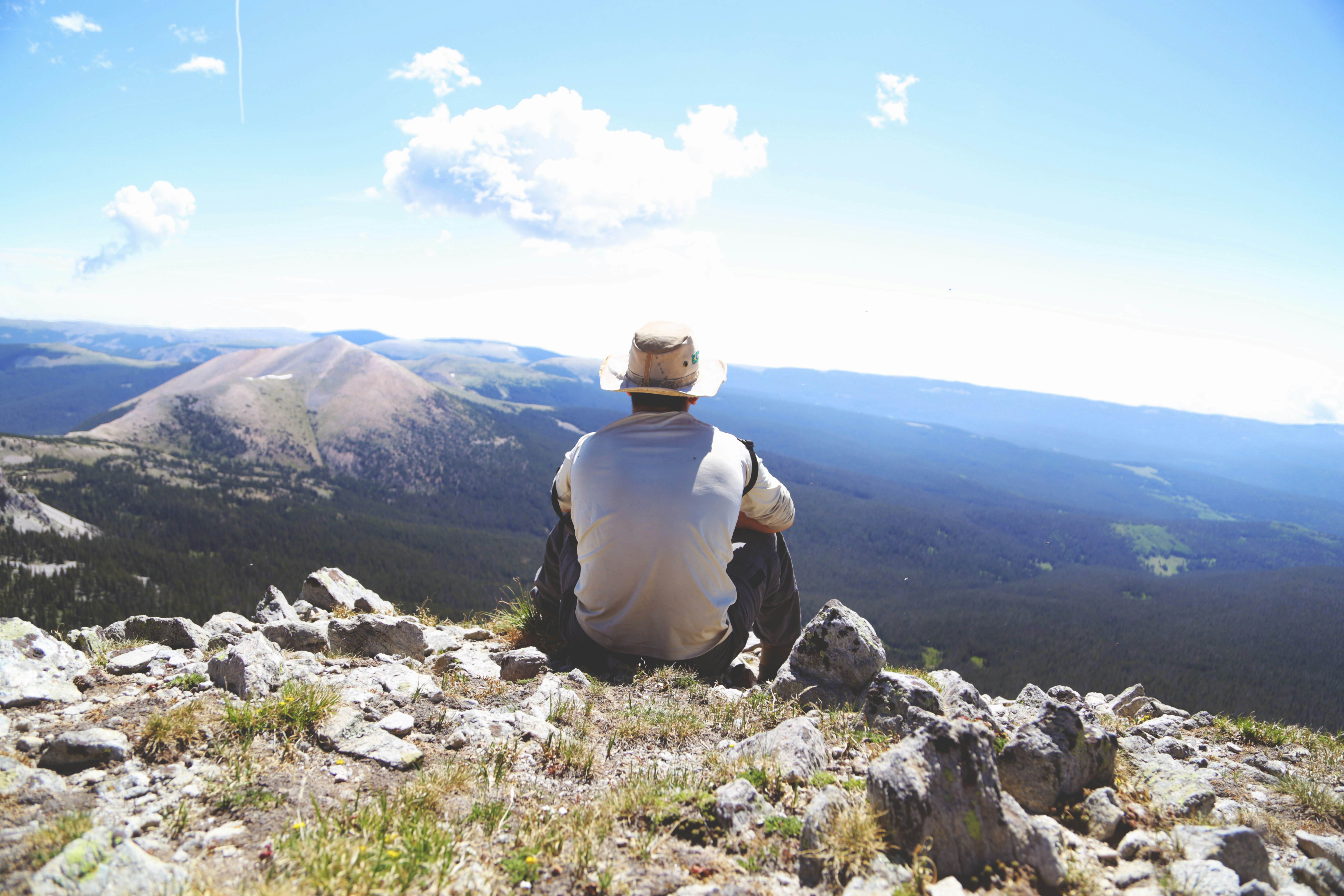 Hiker Overlooking Mountain Landscape