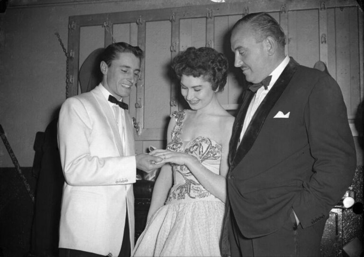 Three People at Formal Ring Ceremony