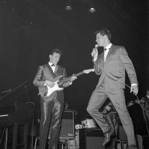 Two Musicians Performing on Stage