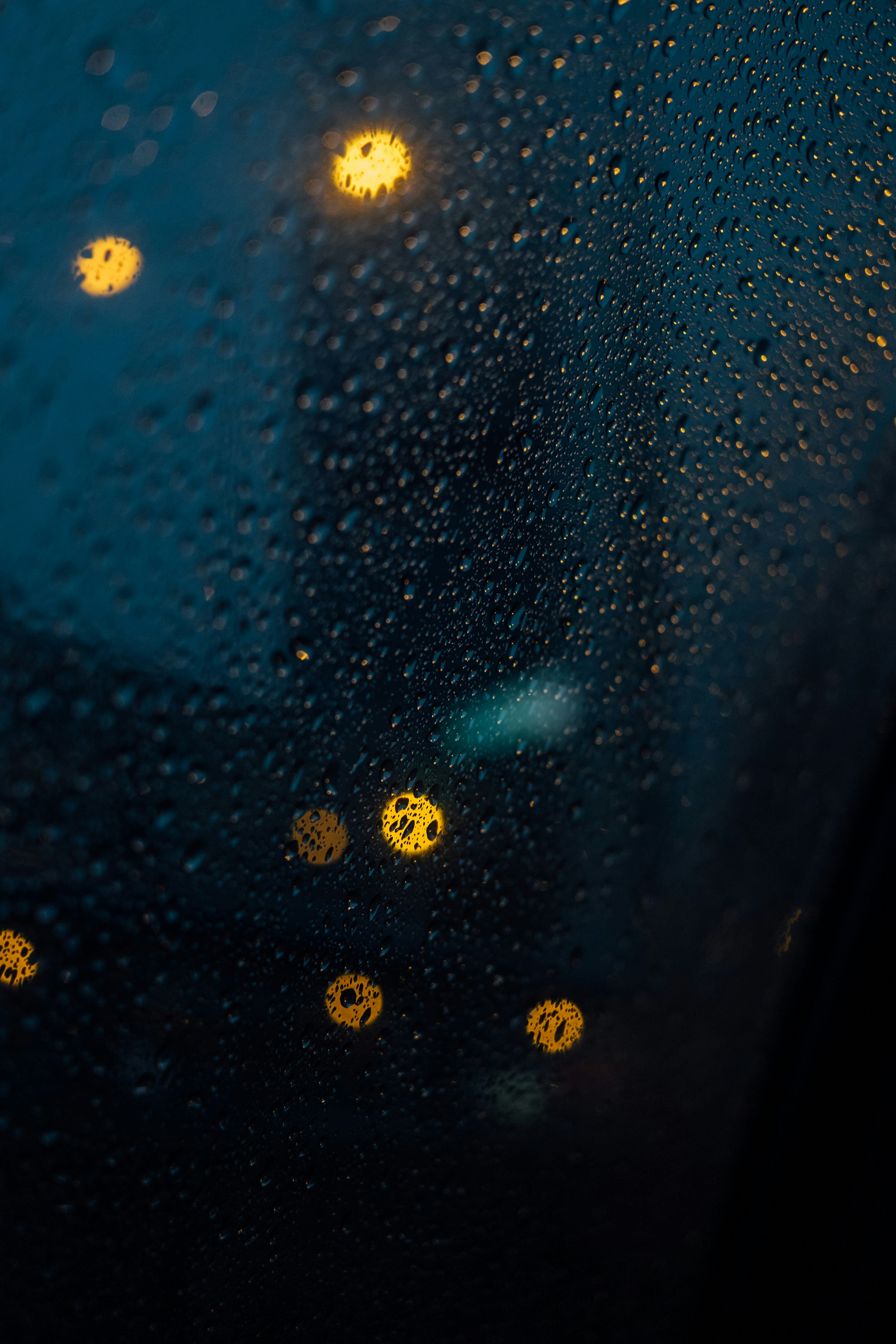 Raindrops on Window at Night