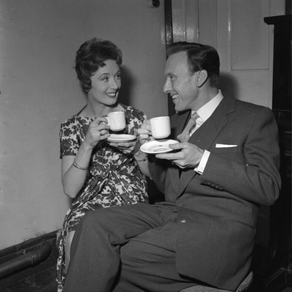Man and Woman Toasting With Cups