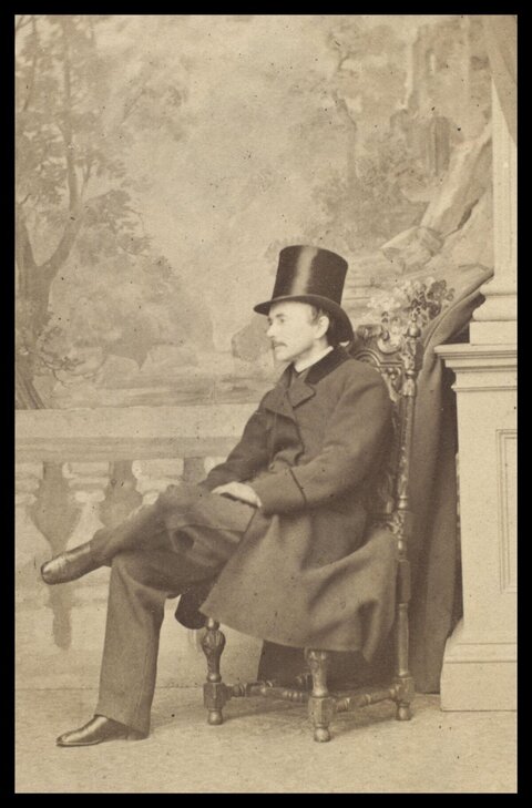 Vintage Portrait of Seated Man in Top Hat