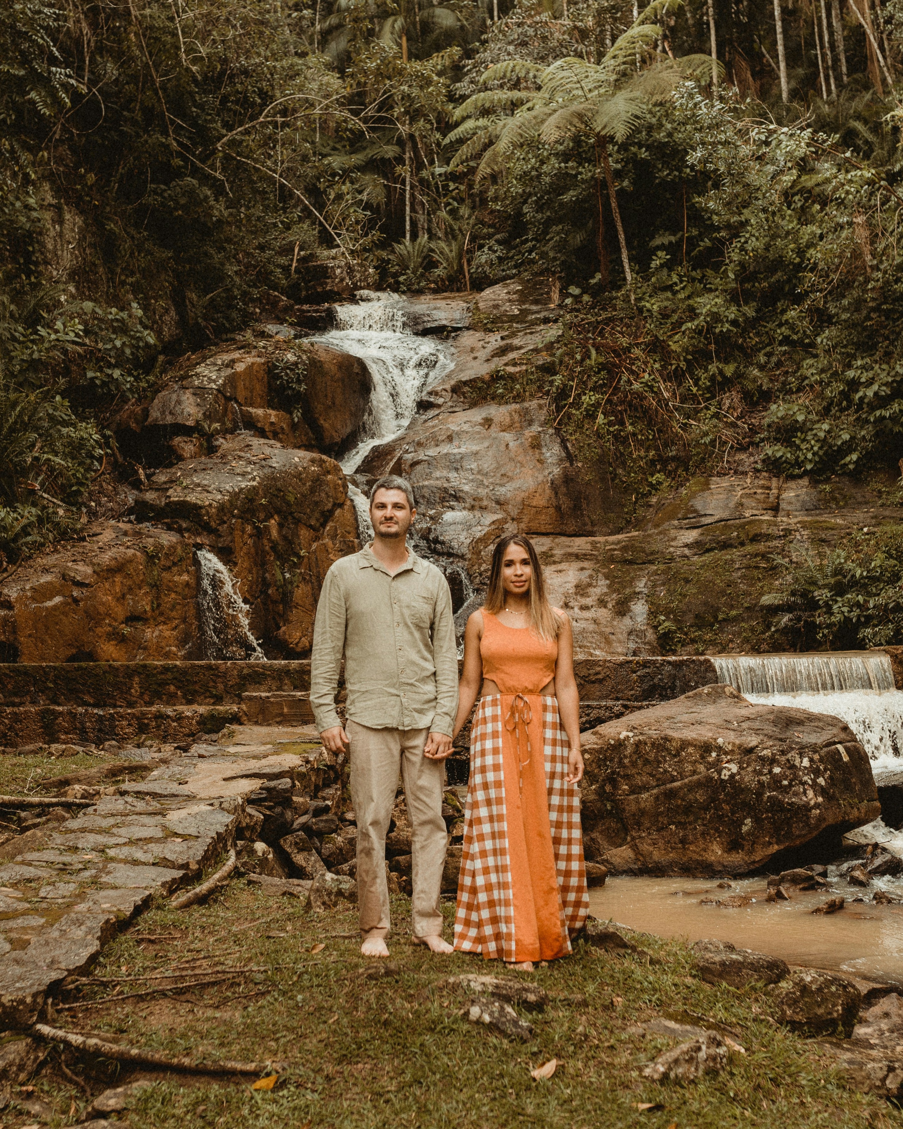 Couple Posing at Forest Waterfall