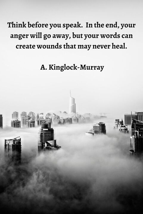 Inspirational Quote on Foggy City Skyline