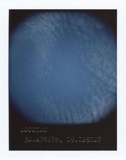 Polaroid Shot of Blue Sky with Clouds