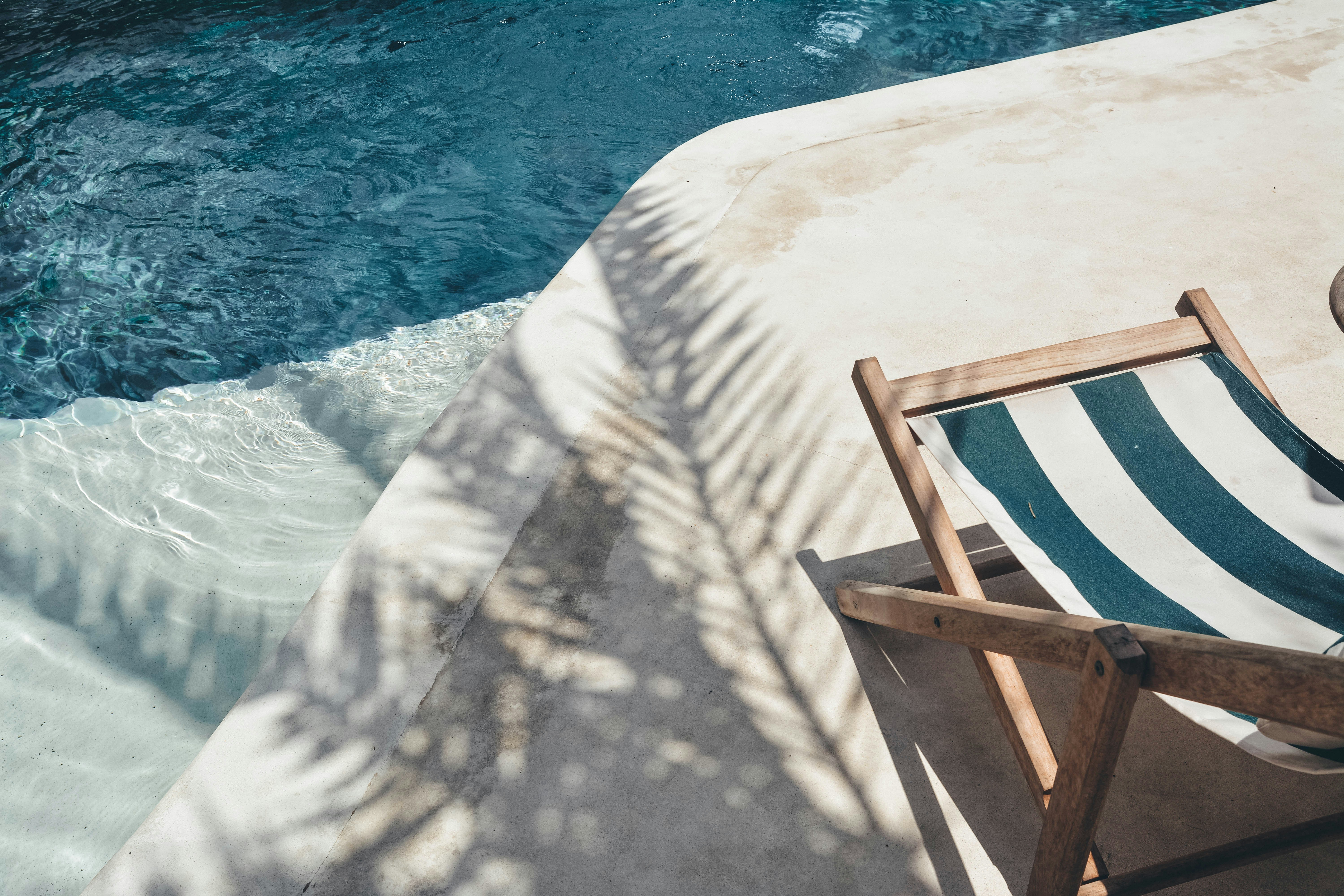 Poolside Lounge Chair by Swimming Pool