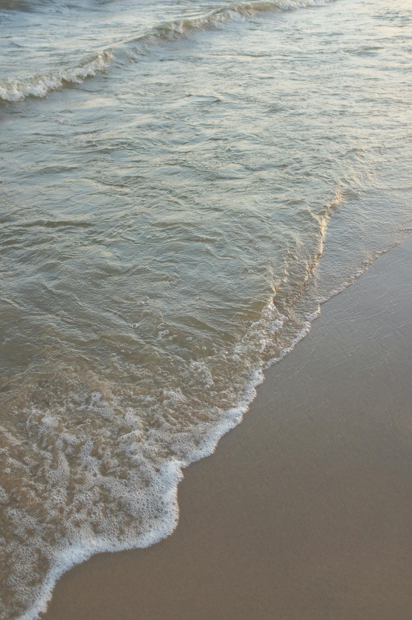Waves Washing onto Sandy Beach — Backgrounds