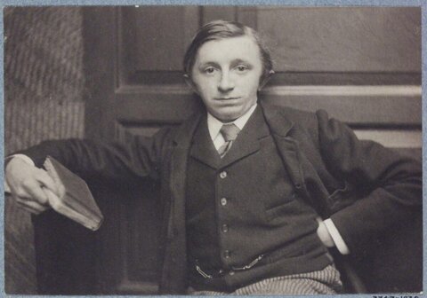 Vintage Portrait of Seated Man with Book