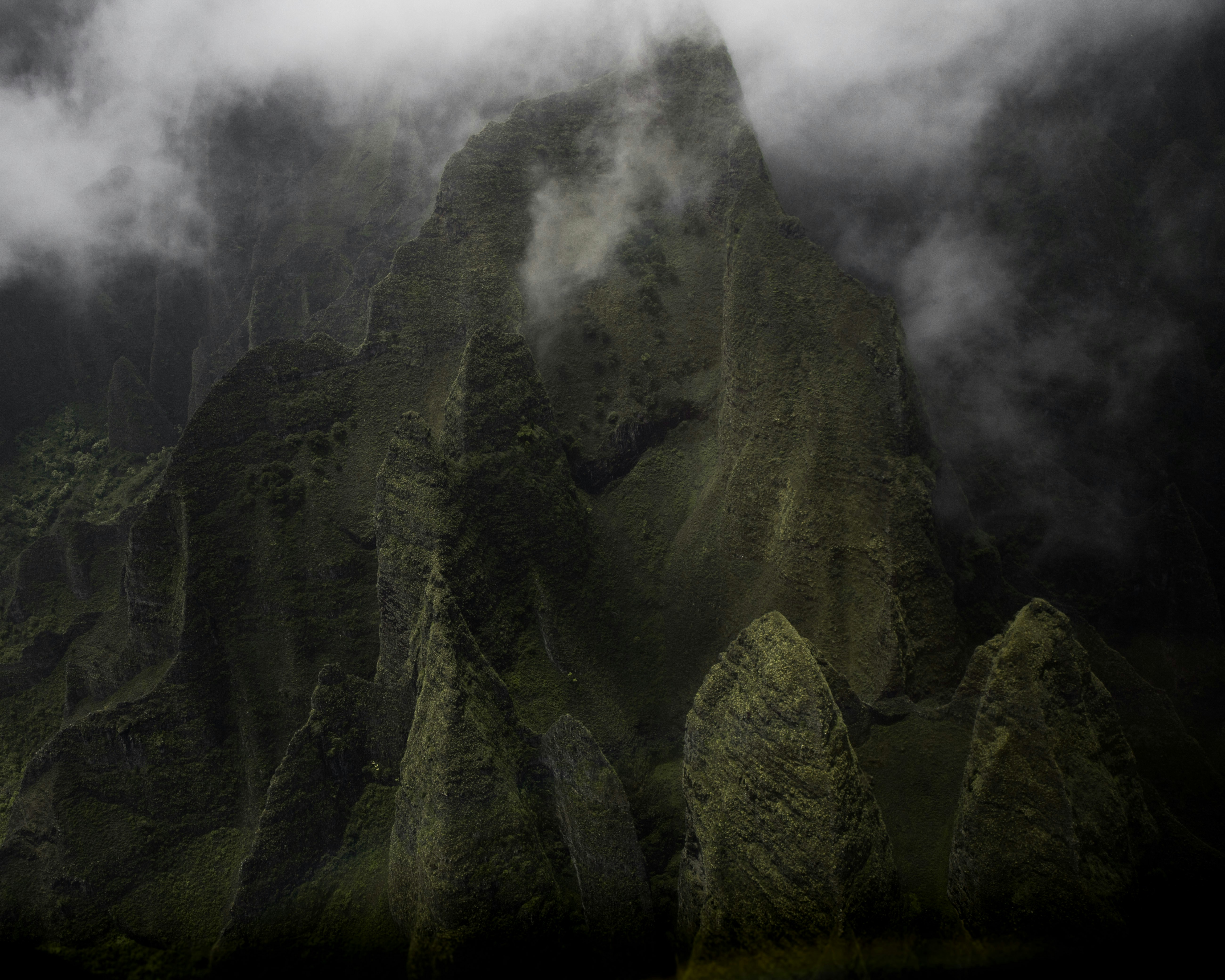 Misty Steep Green Mountain Peaks