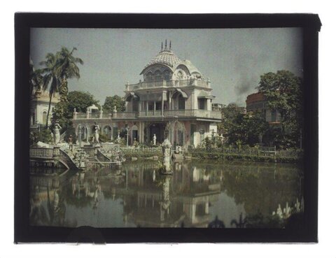 Vintage Ornate Mansion by Pond