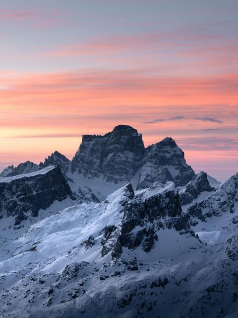 Snowy Mountain Peaks at Sunset