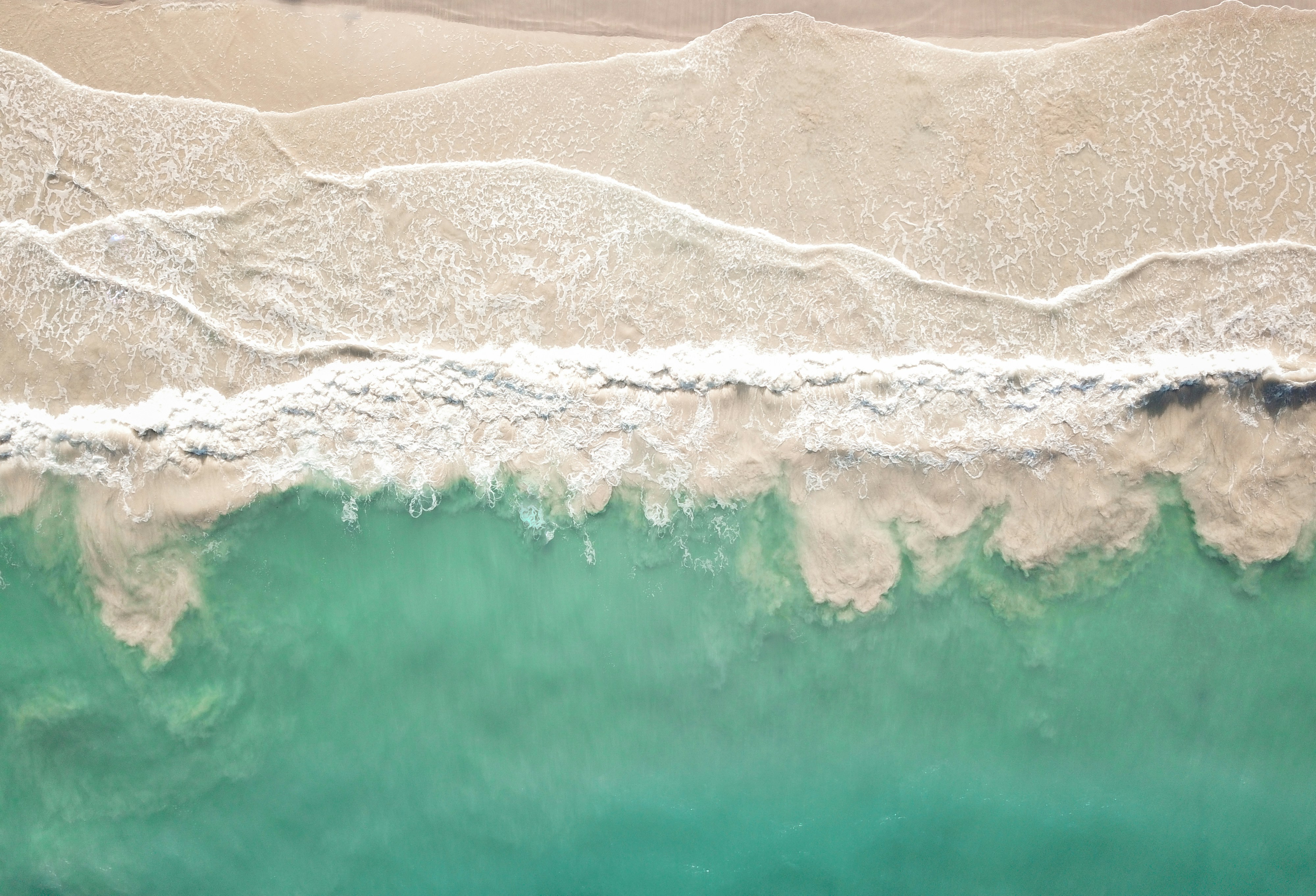 Aerial View of Beach Waves