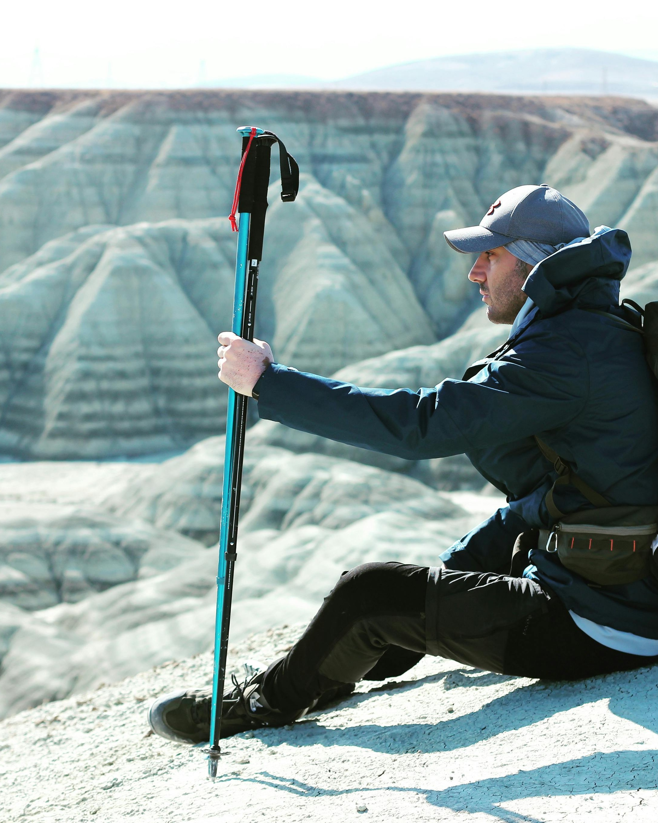 Hiker Resting on Badlands Overlook
