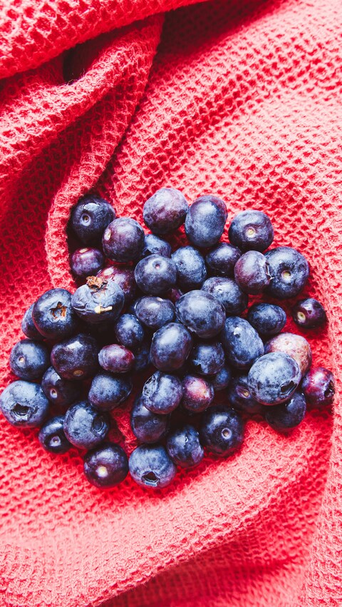 Heart Shaped Blueberries on Red Towel