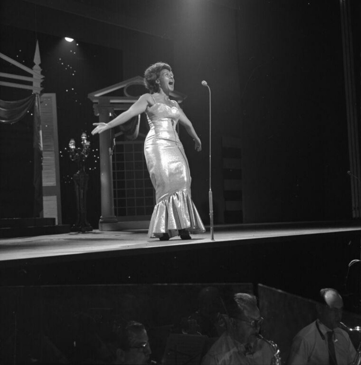 Female Singer Performing on Stage
