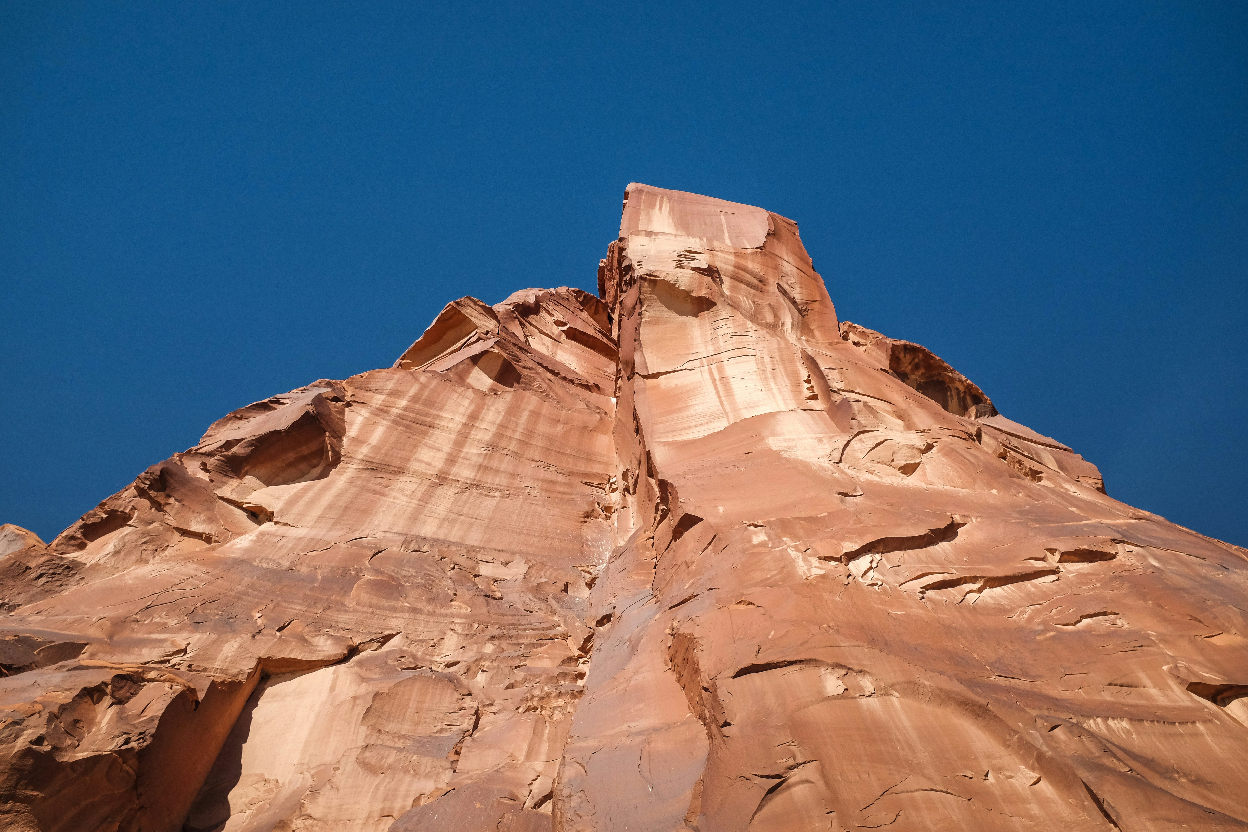 Red Rock Cliff Under Clear Blue Sky