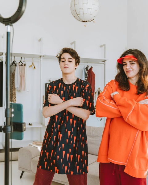 Two Creators Posing For Content Recording