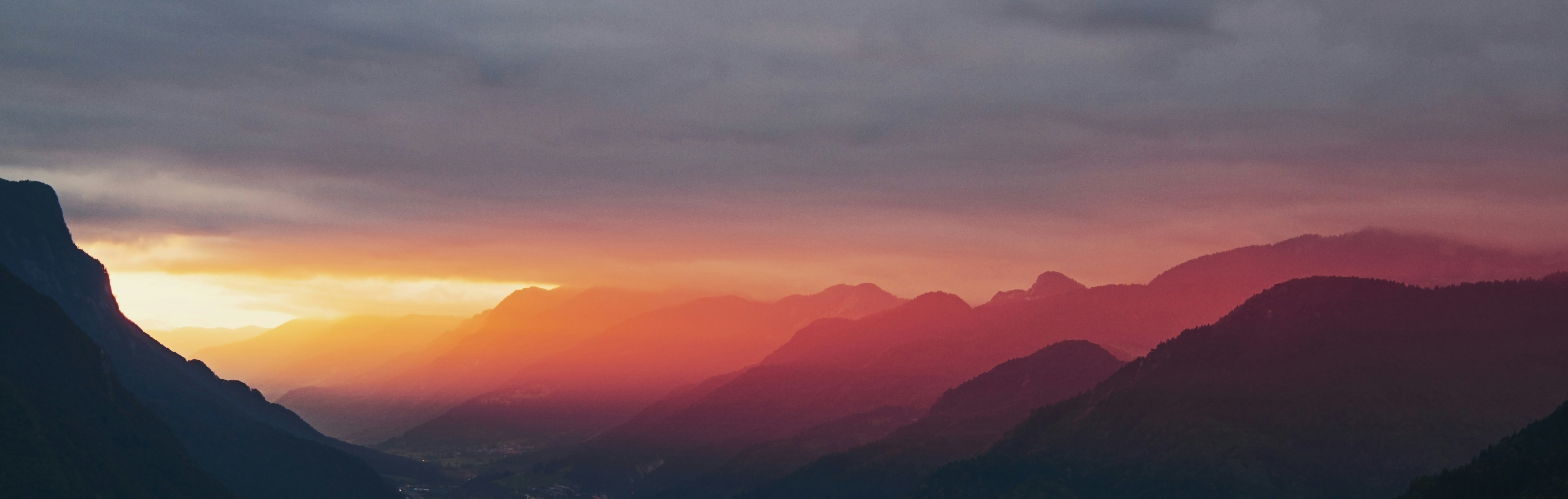 Sunset Over Layered Mountains