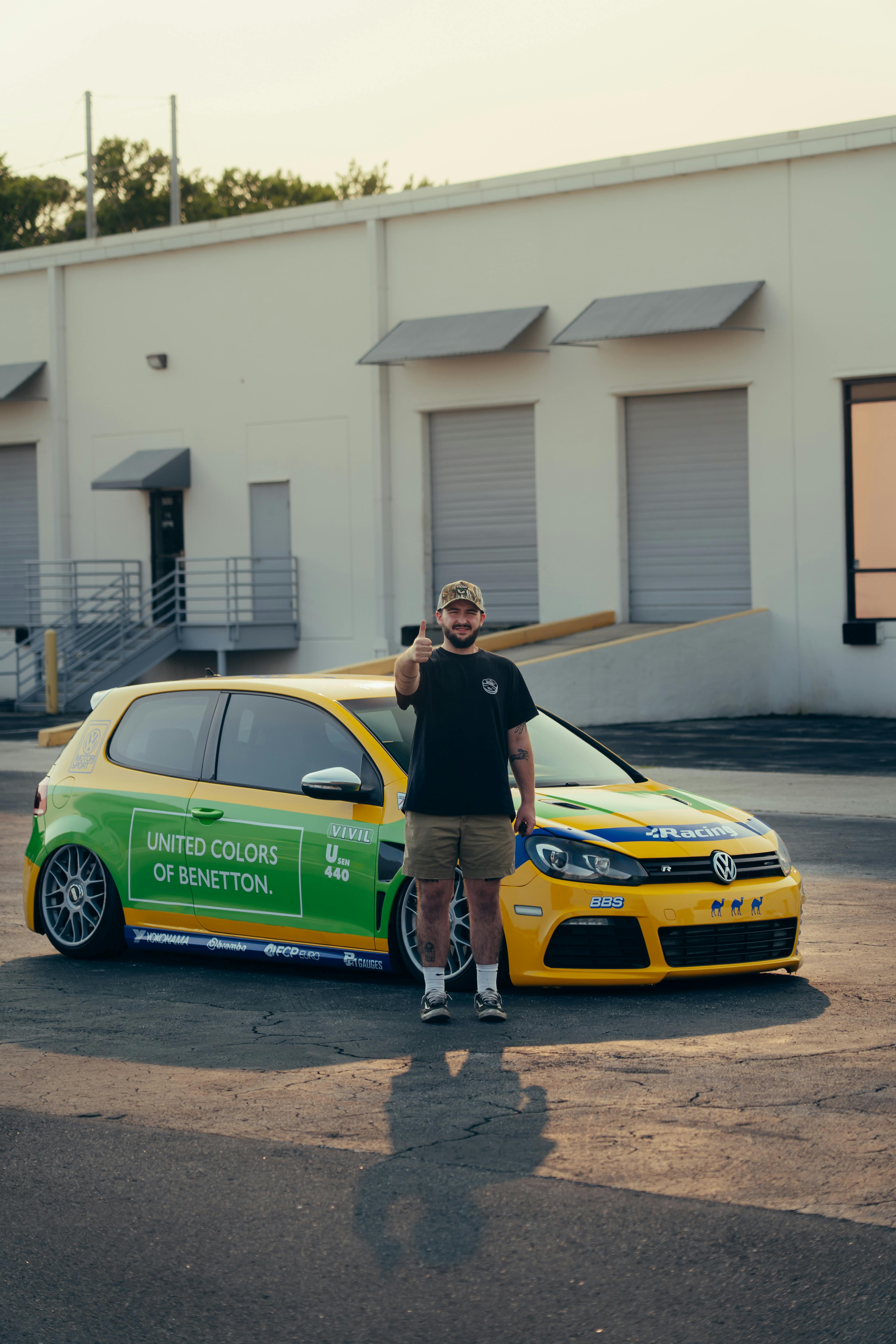 Man With Custom Livery VW Golf Gives Thumbs Up
