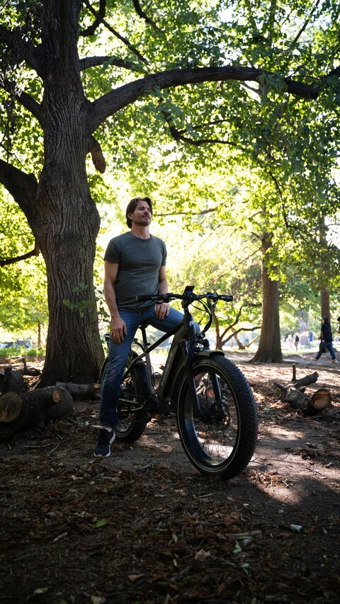 Man with Electric Bike in Park