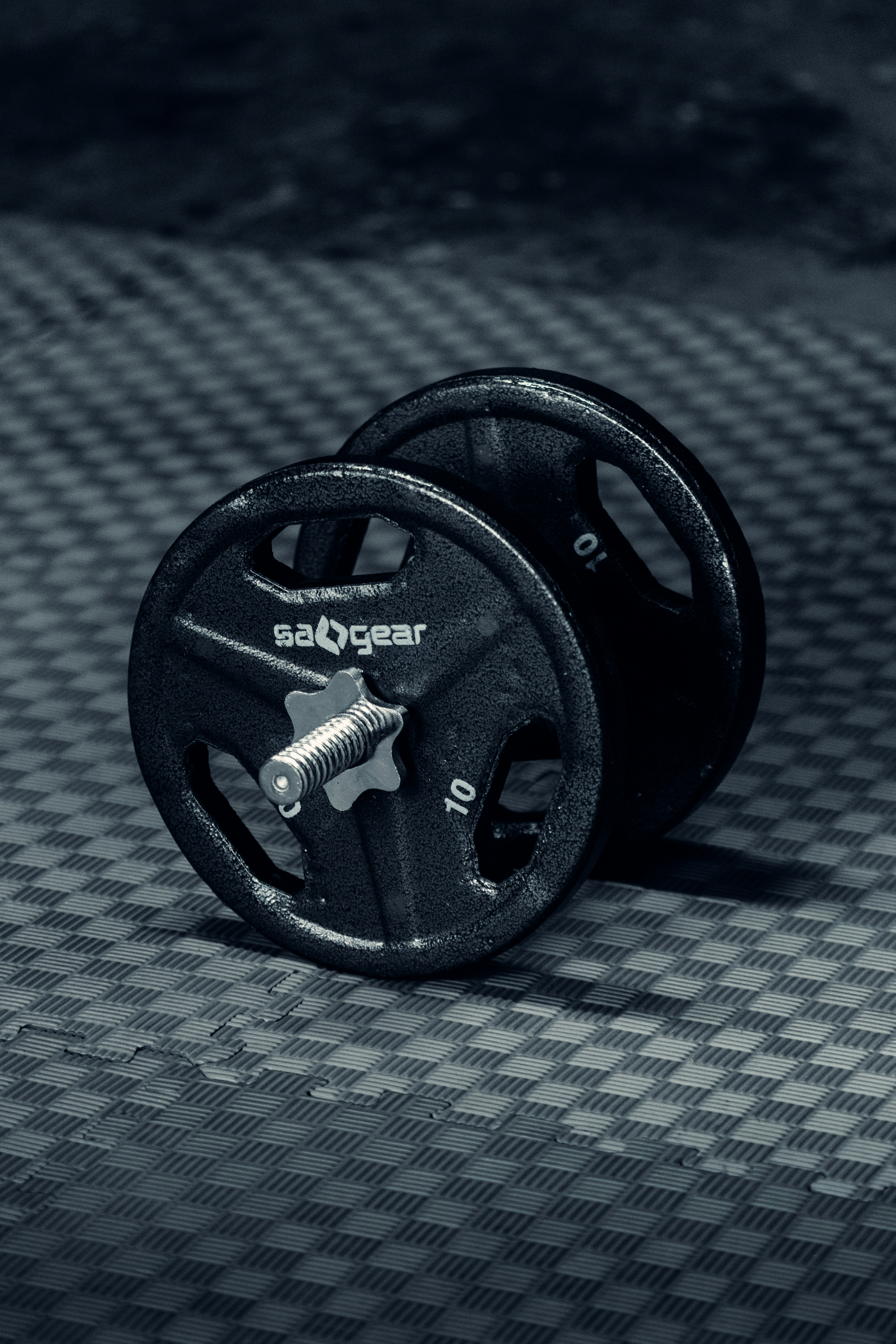 Adjustable Dumbbell on Gym Floor