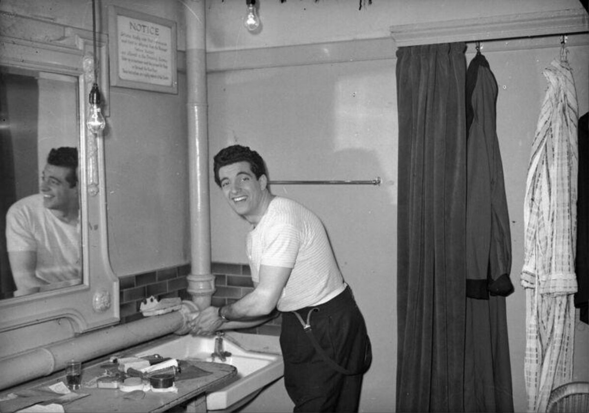 Man Washing Hands In Dressing Room