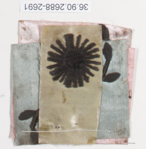 Stacked Textile Fragments with Floral Pattern