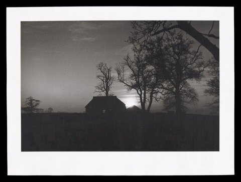 Rural House Silhouette at Sunrise