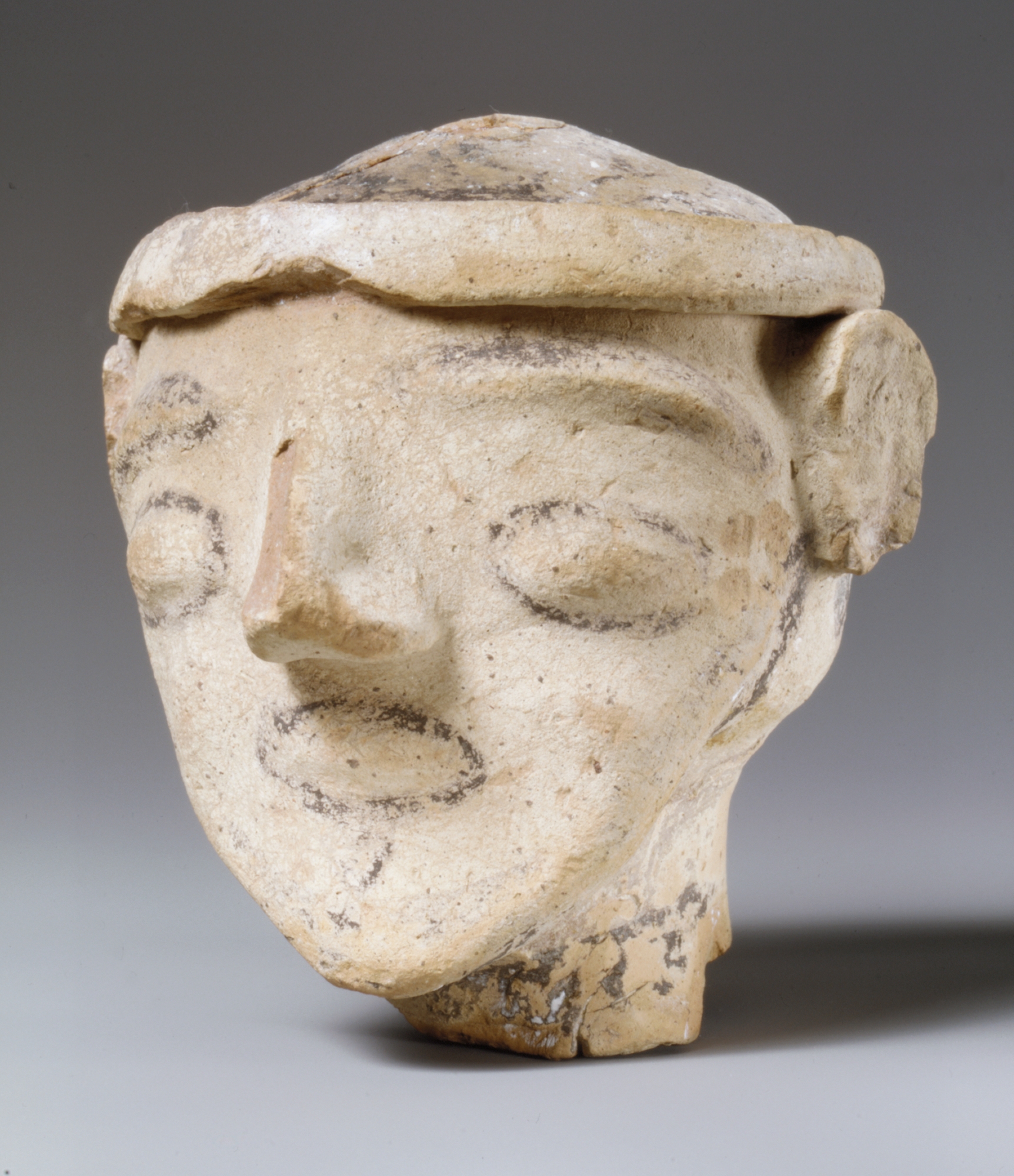 Ancient Carved Stone Head Sculpture