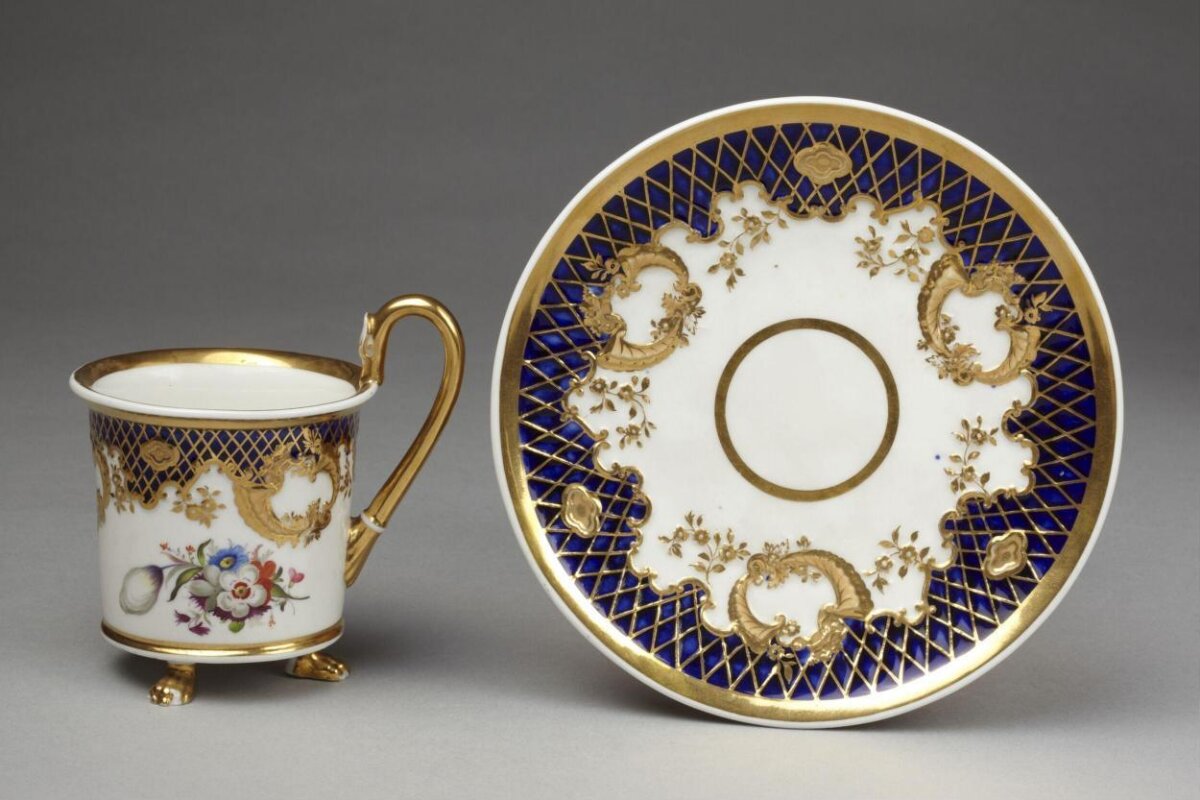 Gilt Blue Porcelain Cup and Saucer