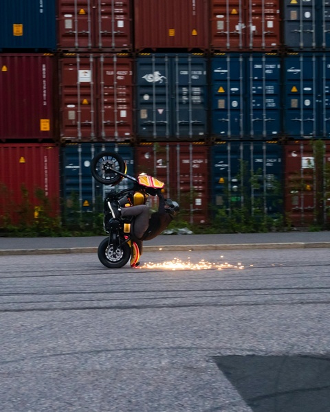 Motorcycle Wheelie Stunt With Sparks