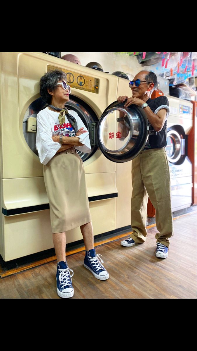 Stylish Senior Couple at Laundromat