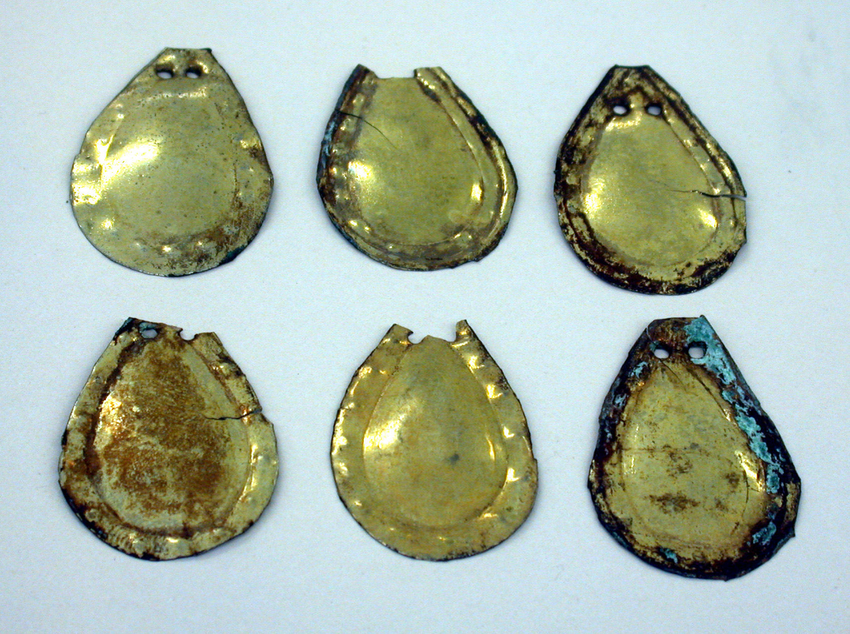 Six Ancient Gilt Pear-shaped Pendants