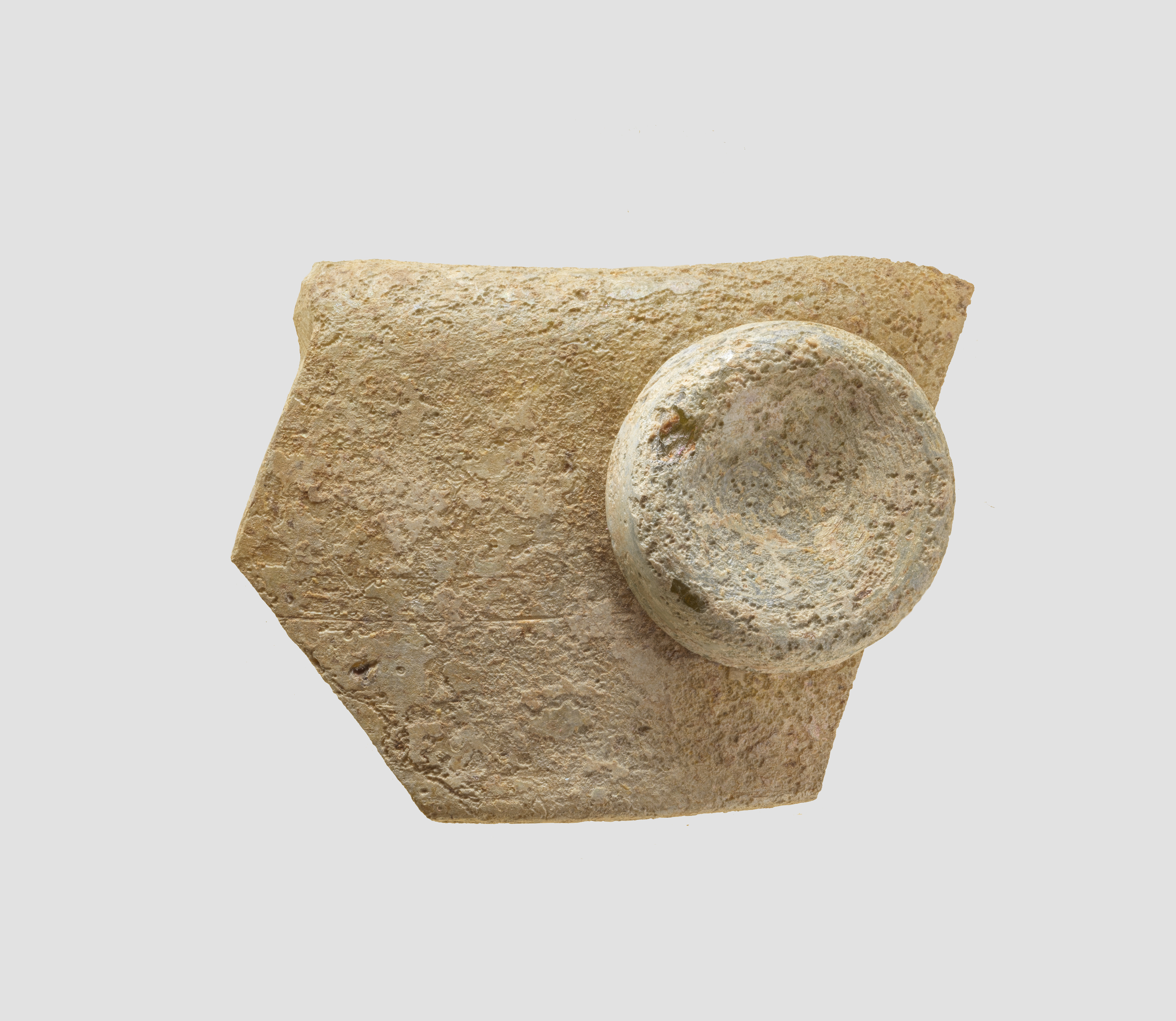 Ancient Stone Fragment with Round Socket
