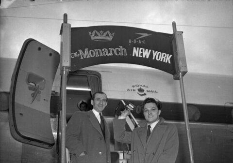 Two Men at BOAC New York Flight Gate