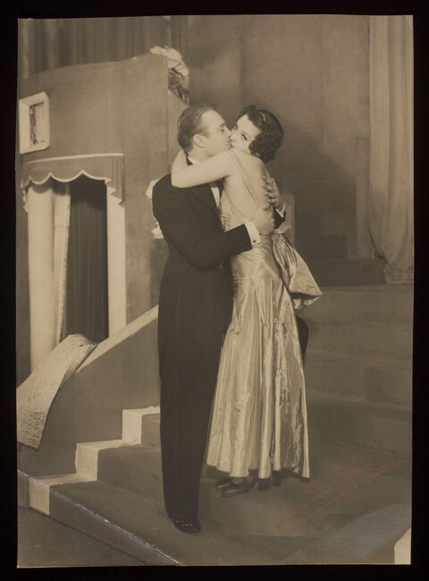 Vintage Couple Kissing On Stage